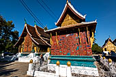 Wat Xieng Thong temple in Luang Prabang, Laos.  La Chapelle Rouge , the Red Chapel. It contains an especially rare reclining Buddha. 